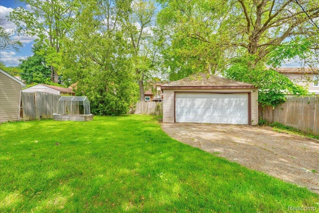 14004 Abington Ave, Detroit, MI 48227 - view of yard with an outbuilding and a garage