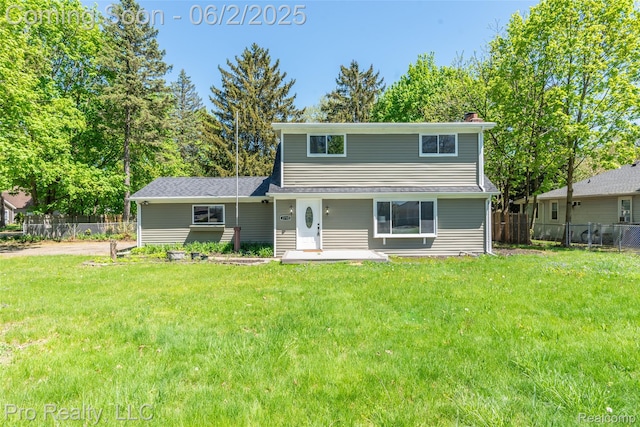 2750 Lansdowne Rd, Waterford, MI 48329 - traditional home with a chimney