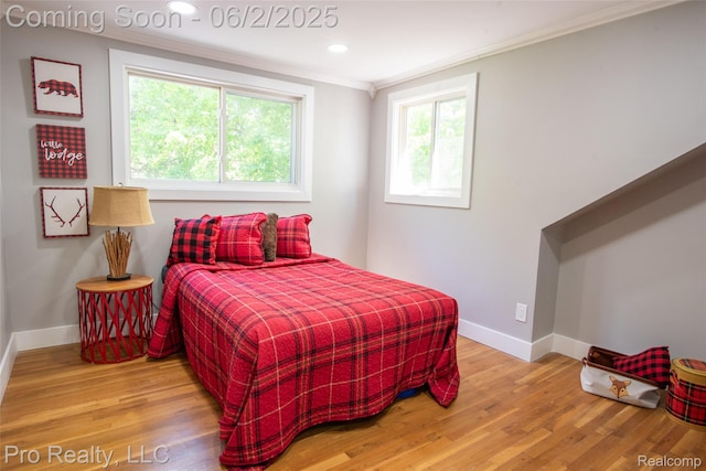 2750 Lansdowne Rd, Waterford, MI 48329 - bedroom featuring ornamental molding, wood finished floors, baseboards, and recessed lighting