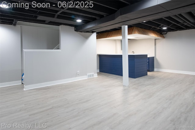 2750 Lansdowne Rd, Waterford, MI 48329 - finished below grade area featuring baseboards and wood finished floors