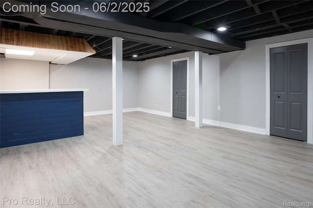 2750 Lansdowne Rd, Waterford, MI 48329 - finished below grade area featuring wood finished floors and baseboards