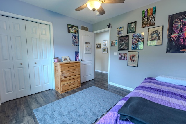 6573 Sweet Clover Hills Dr, Jonesville, MI 49250 - bedroom featuring dark wood finished floors, a closet, baseboards, and ceiling fan