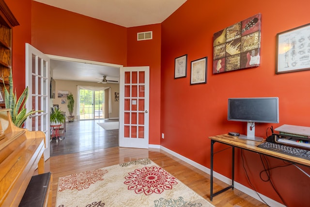 6573 Sweet Clover Hills Dr, Jonesville, MI 49250 - office with french doors, wood finished floors, baseboards, and a ceiling fan
