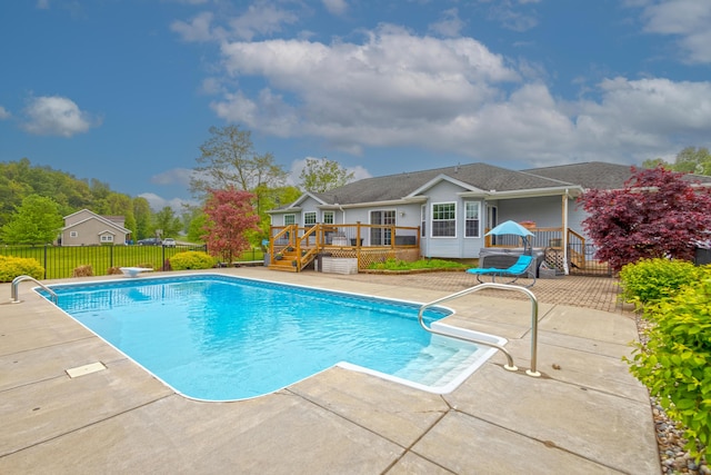 6573 Sweet Clover Hills Dr, Jonesville, MI 49250 - view of swimming pool featuring a deck and a patio area