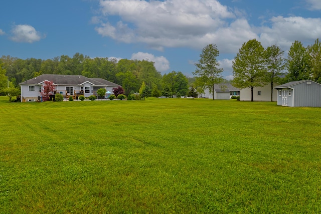 6573 Sweet Clover Hills Dr, Jonesville, MI 49250 - view of green lawn featuring an outdoor structure