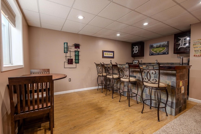 6573 Sweet Clover Hills Dr, Jonesville, MI 49250 - indoor wet bar with wood finished floors, baseboards, recessed lighting, and a drop ceiling