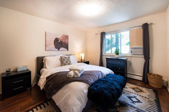 116/118 Glendale Dr, Ann Arbor, MI 48103 - bedroom with a baseboard radiator, wood finished floors, and cooling unit