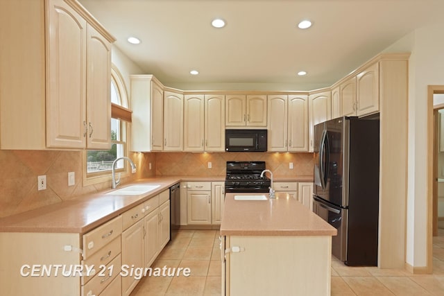 3803 Prairie Creek St, Saginaw, MI 48603 - kitchen featuring black appliances, a sink, light brown cabinetry, and recessed lighting