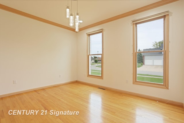 3803 Prairie Creek St, Saginaw, MI 48603 - empty room featuring wood finished floors and baseboards