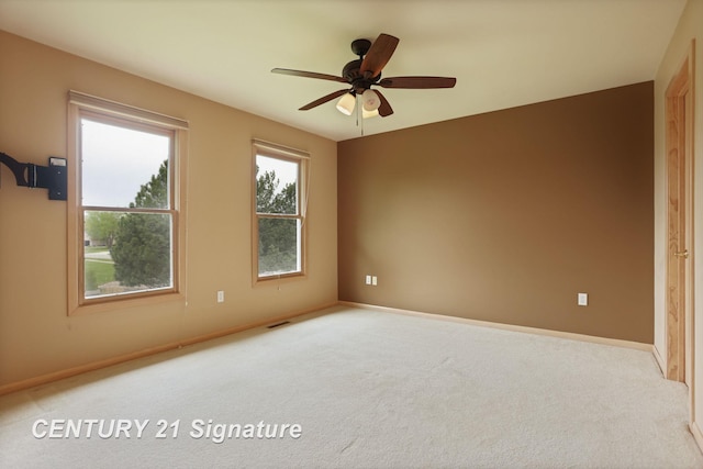 3803 Prairie Creek St, Saginaw, MI 48603 - carpeted spare room with baseboards and ceiling fan