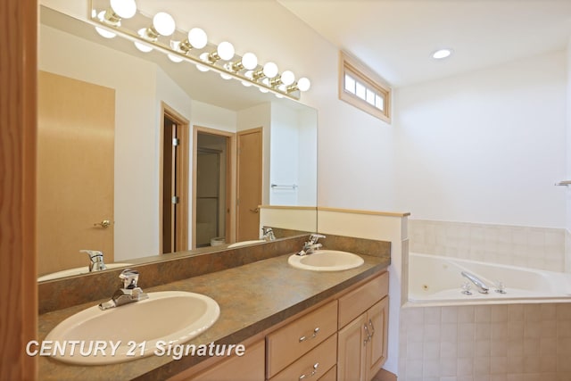 3803 Prairie Creek St, Saginaw, MI 48603 - bathroom with a bath and double vanity