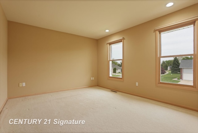 3803 Prairie Creek St, Saginaw, MI 48603 - carpeted empty room with baseboards and recessed lighting
