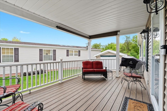 11855 Cedarbrook Dr, South Lyon, MI 48178 - deck featuring a lawn