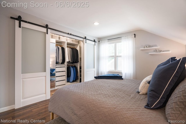 1395 Aline Dr, Grosse Pointe Woods, MI 48236 - bedroom with a barn door, dark wood-style flooring, lofted ceiling, and a closet