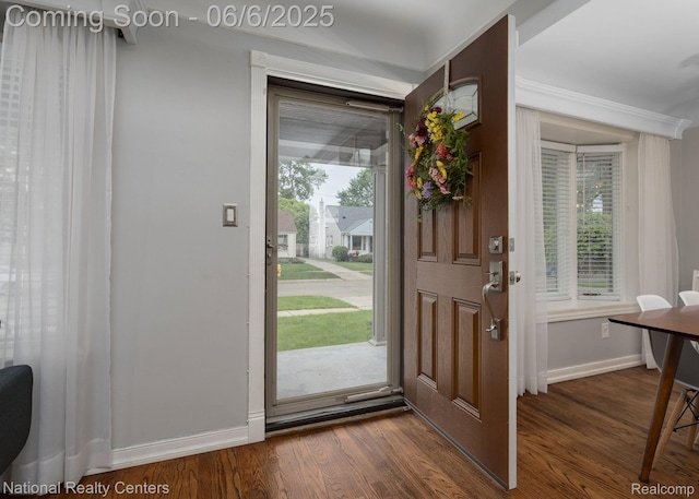 1395 Aline Dr, Grosse Pointe Woods, MI 48236 - entrance foyer with baseboards, plenty of natural light, dark wood finished floors, and crown molding