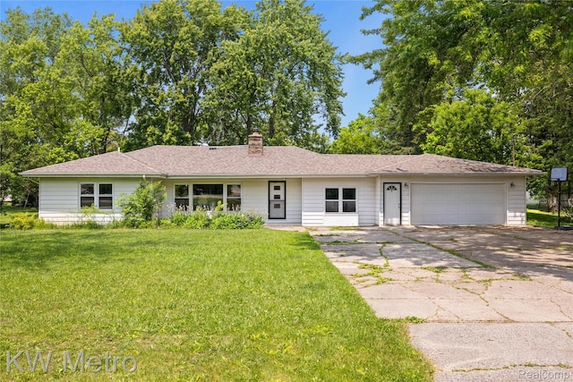 3191 Perry Ct, Grand Blanc, MI 48439 - ranch-style home featuring driveway, an attached garage, a front lawn, and a chimney