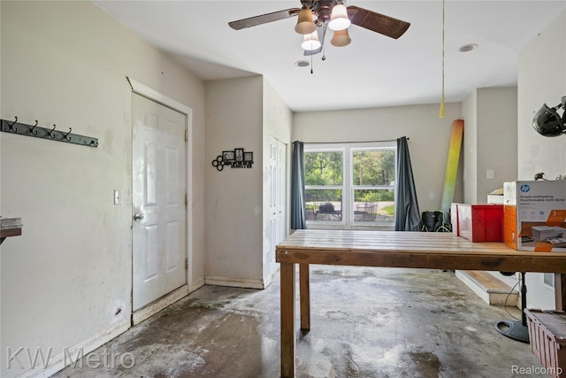 3191 Perry Ct, Grand Blanc, MI 48439 - home office featuring ceiling fan, concrete floors, and baseboards