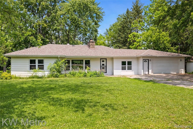 3191 Perry Ct, Grand Blanc, MI 48439 - ranch-style house featuring a garage, a chimney, driveway, and a front yard