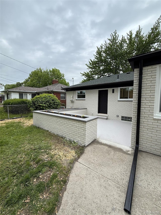 20218 Chalon St, Saint Clair Shores, MI 48080 - back of property featuring brick siding