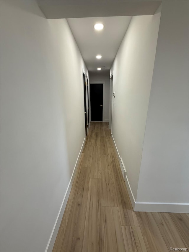 20218 Chalon St, Saint Clair Shores, MI 48080 - hallway with light wood finished floors, baseboards, and recessed lighting