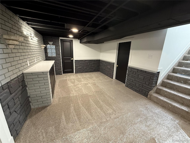 20218 Chalon St, Saint Clair Shores, MI 48080 - finished below grade area with light carpet, stairs, and a wainscoted wall