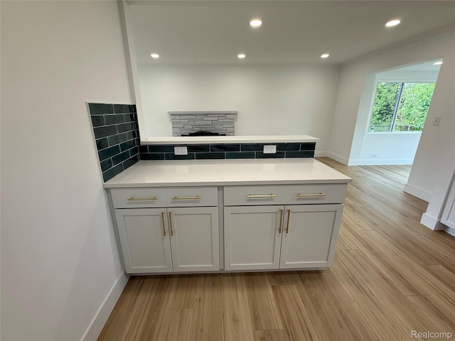 20218 Chalon St, Saint Clair Shores, MI 48080 - kitchen featuring a peninsula, gray cabinets, light countertops, baseboards, and recessed lighting