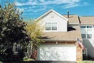 5906 Creekside Dr, Troy, MI 48085 - view of front facade featuring asphalt driveway and a garage