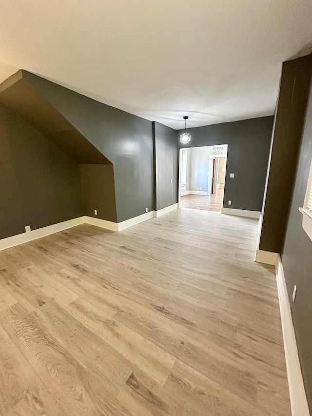 388 Chalmers St, Detroit, MI 48215 - bonus room featuring light wood-style flooring and baseboards