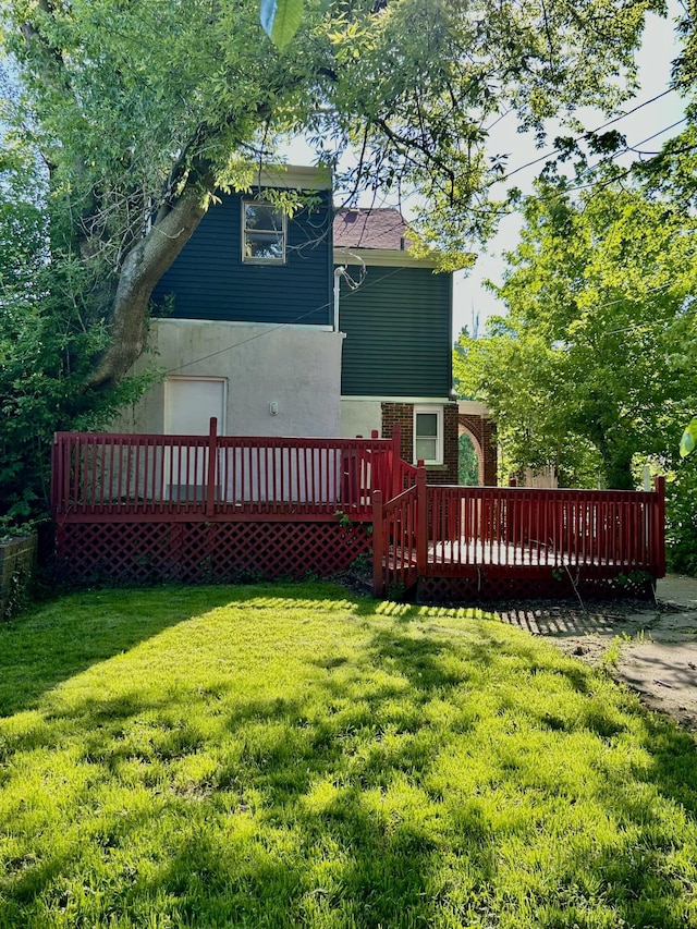 388 Chalmers St, Detroit, MI 48215 - rear view of property with a wooden deck and a yard