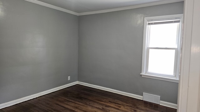 15465 Murray Hl, Detroit, MI 48227 - empty room with dark wood-type flooring, baseboards, and ornamental molding