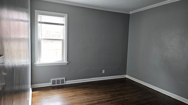 15465 Murray Hl, Detroit, MI 48227 - empty room featuring ornamental molding, dark wood-style floors, and baseboards