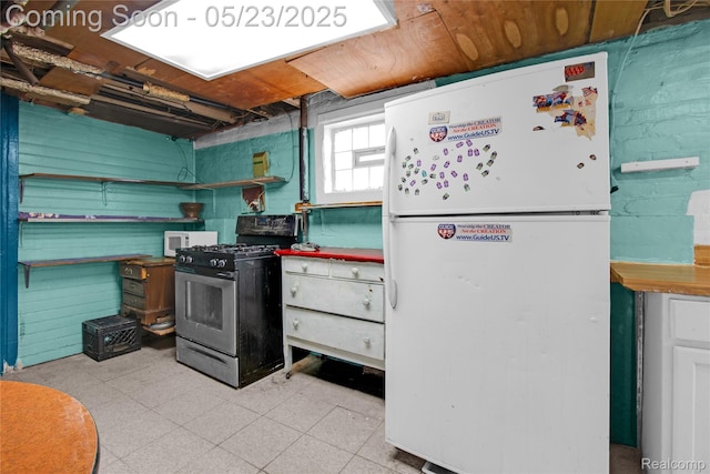 2393 Burger St, Hamtramck, MI 48212 - kitchen with white appliances and light floors