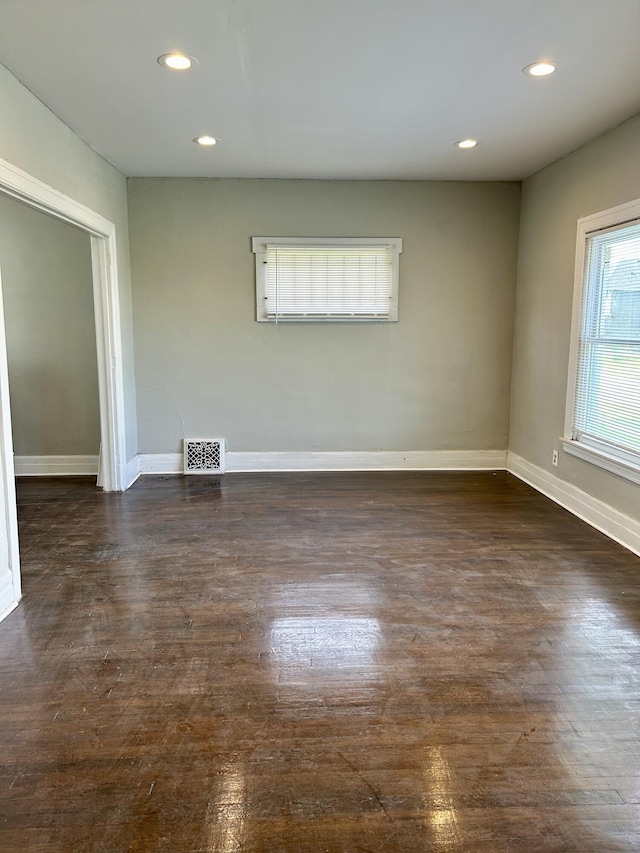 2927 Seyburn St, Detroit, MI 48214 - unfurnished room with baseboards, recessed lighting, and dark wood-style floors