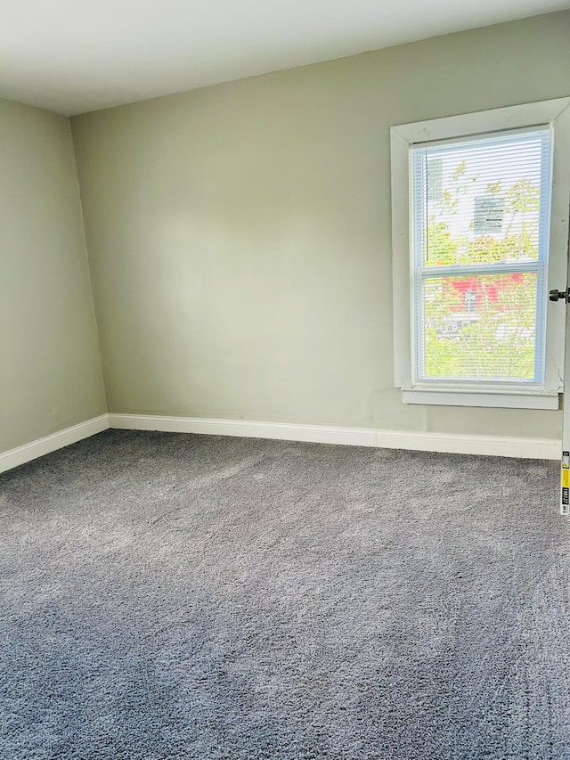 2927 Seyburn St, Detroit, MI 48214 - unfurnished room featuring carpet and baseboards