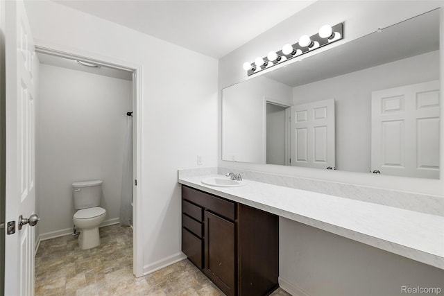 24603 Beach Dr, Macomb, MI 48042 - bathroom featuring vanity, toilet, baseboards, and stone finish flooring