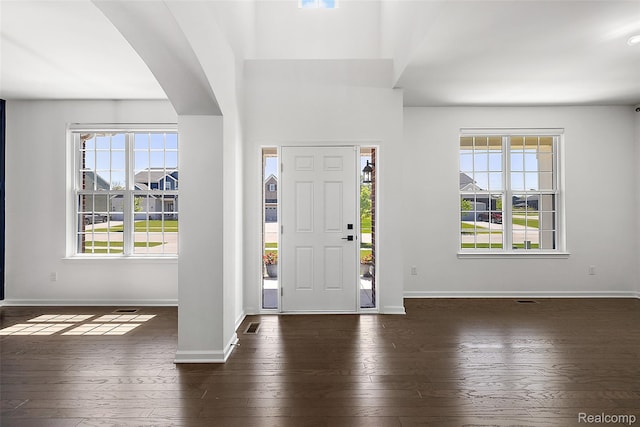 24603 Beach Dr, Macomb, MI 48042 - entrance foyer with hardwood / wood-style floors, baseboards, and arched walkways