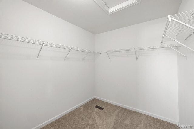 24603 Beach Dr, Macomb, MI 48042 - walk in closet with carpet flooring and attic access