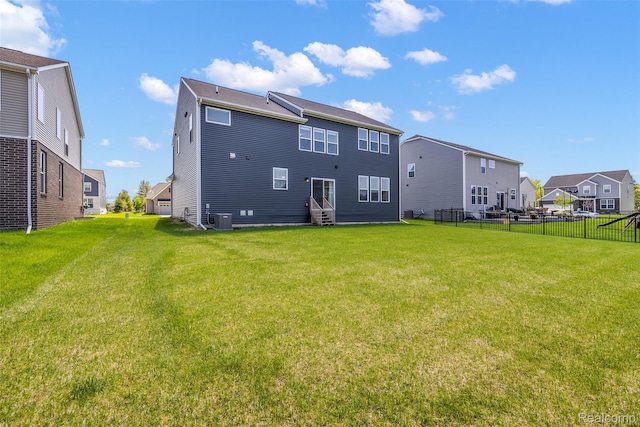 24603 Beach Dr, Macomb, MI 48042 - rear view of property with entry steps, cooling unit, and a residential view