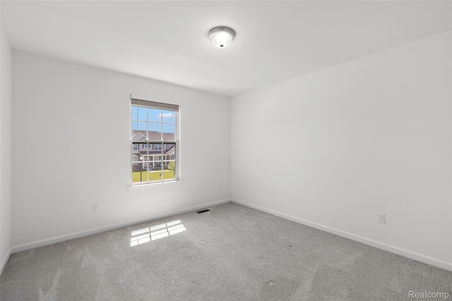 24603 Beach Dr, Macomb, MI 48042 - carpeted spare room with baseboards