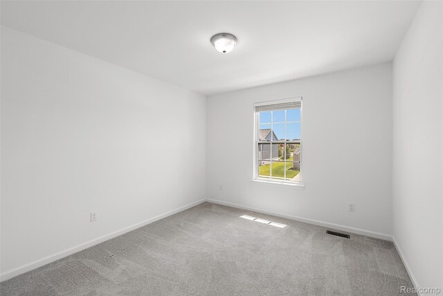 24603 Beach Dr, Macomb, MI 48042 - spare room with carpet and baseboards