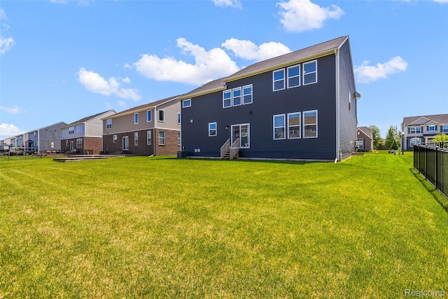 24603 Beach Dr, Macomb, MI 48042 - rear view of property featuring entry steps and a residential view