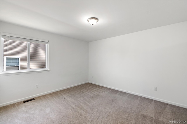 24603 Beach Dr, Macomb, MI 48042 - carpeted spare room with baseboards