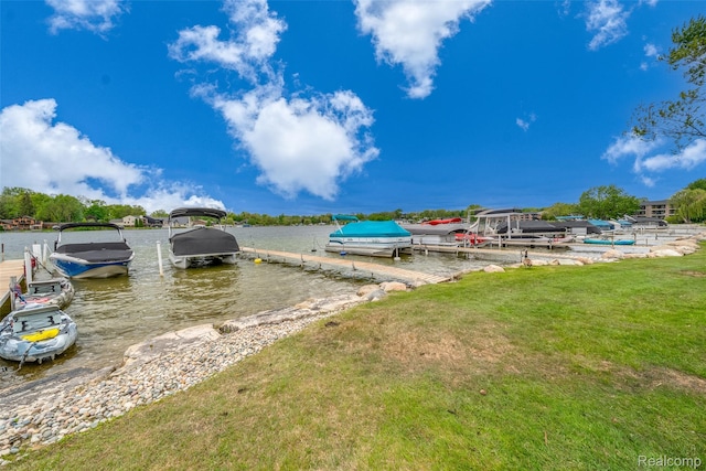 3553 Port Cove Dr Unit 39, Waterford, MI 48328 - dock area with boat lift and a yard