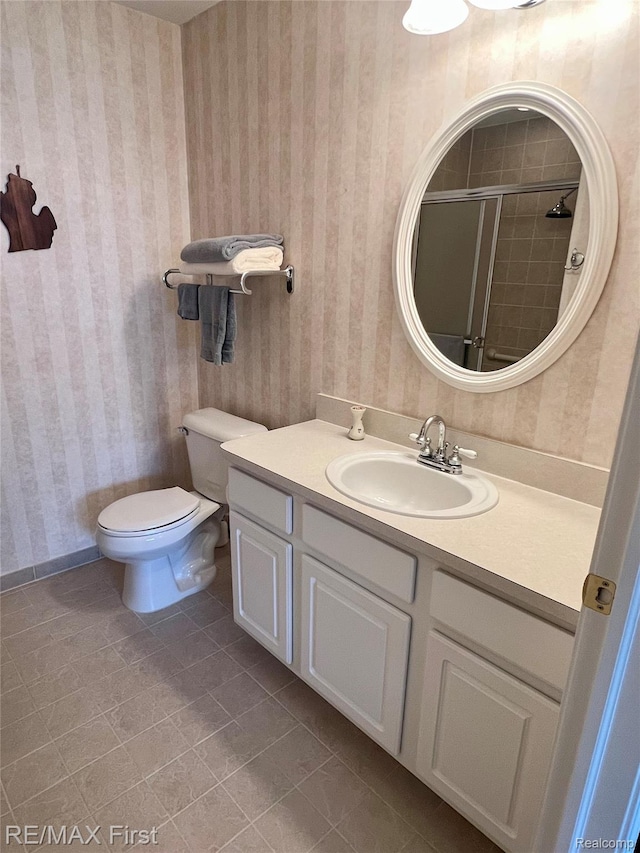 46117 Rhodes Dr Unit 298, Macomb, MI 48044 - full bathroom with wallpapered walls, vanity, tile patterned floors, toilet, and a shower with door