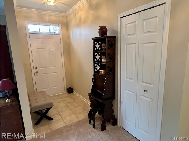 46117 Rhodes Dr Unit 298, Macomb, MI 48044 - foyer entrance with crown molding, light tile patterned floors, and baseboards