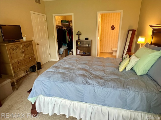 46117 Rhodes Dr Unit 298, Macomb, MI 48044 - bedroom featuring carpet, a spacious closet, a closet, and ensuite bathroom