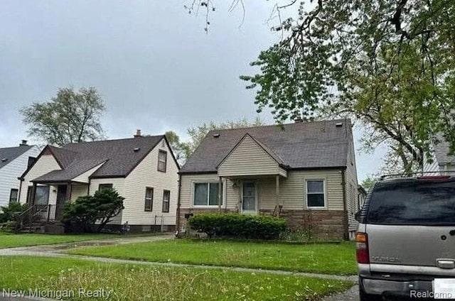 4449 Academy St, Dearborn Heights, MI 48125 - view of front of property with a front lawn