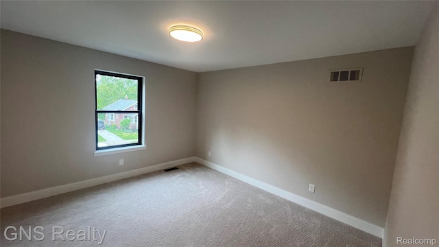 206 E Windemere Ave, Royal Oak, MI 48073 - carpeted empty room featuring baseboards