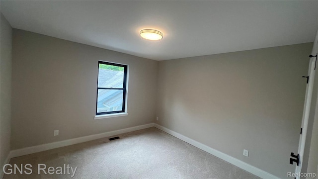 206 E Windemere Ave, Royal Oak, MI 48073 - empty room featuring light colored carpet and baseboards