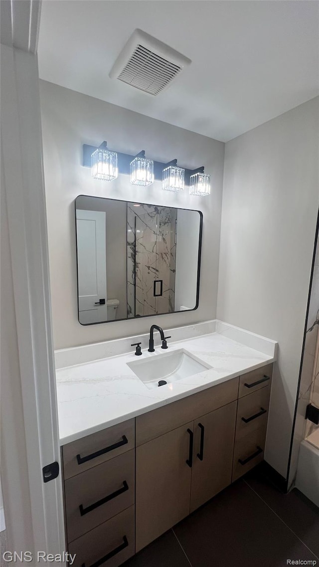 206 E Windemere Ave, Royal Oak, MI 48073 - full bath featuring vanity, tile patterned flooring, and a shower